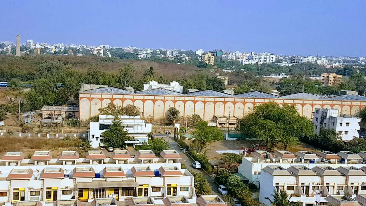 Aerial view of Jamshri Mills in 2010, a long historic mill hall within the Solapur estate